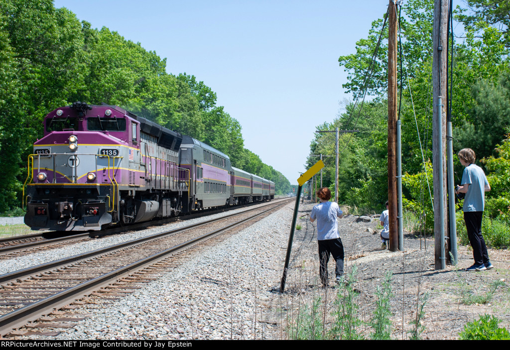 An MBTA outbound passes a gaggle of Railfans 